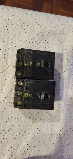 Two three pole Square D Breakers
