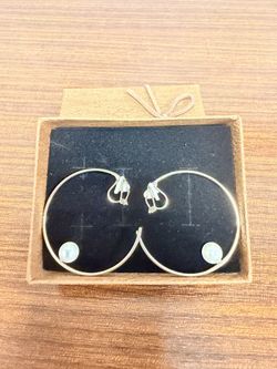 Gold-tone pearl accent clip-on hoops, lightweight and brand new.