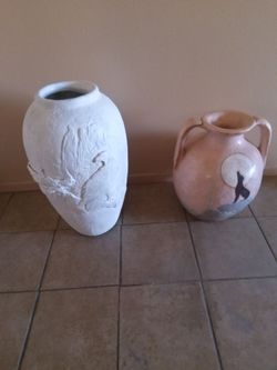 Beautiful 27 inch tall plaster of paris floor vase with eagles nesting and floor vase with desert scene both like new perfect located in palm springs 