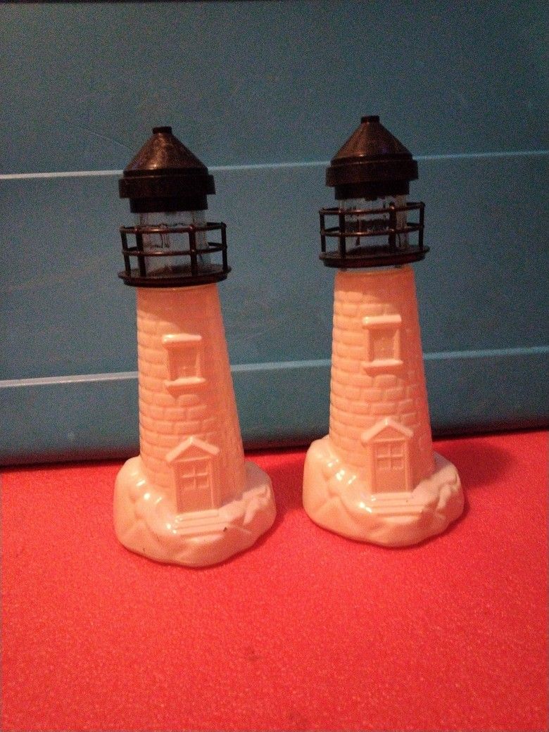 Two Vintage Lighthouse Old Spice Avon Bottles