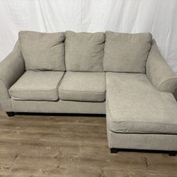 Beige Couch With Reversible Chaise  