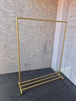 Rolling clothing rack