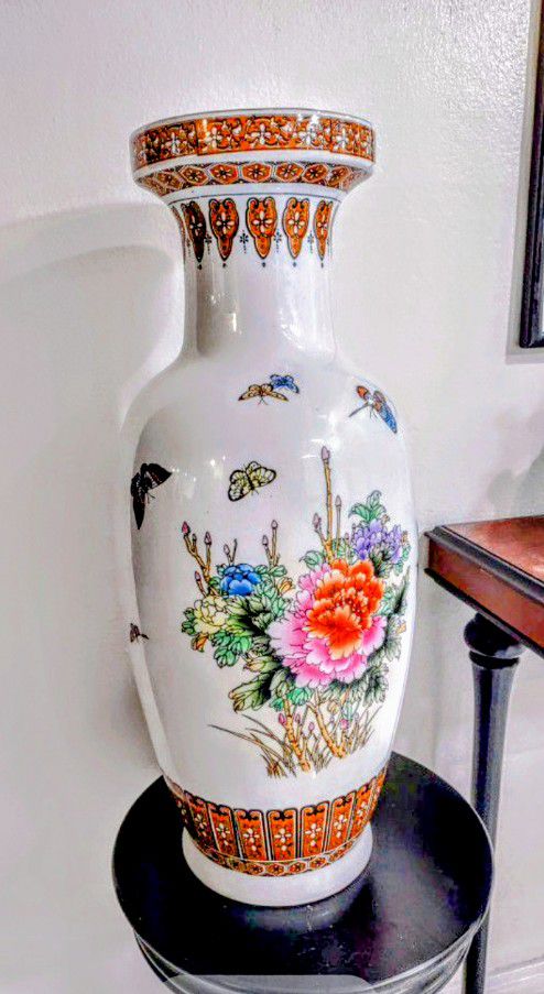 24" Tall- Oriental Porcelain Peacock; Butterflies and Flowers Design Vase; no marking on bottom.
