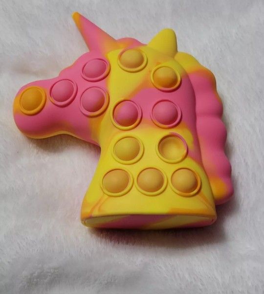 3- D Unicorn Pop fidget toy with Lights Stress Relief. Pink & Yellow Beautiful!