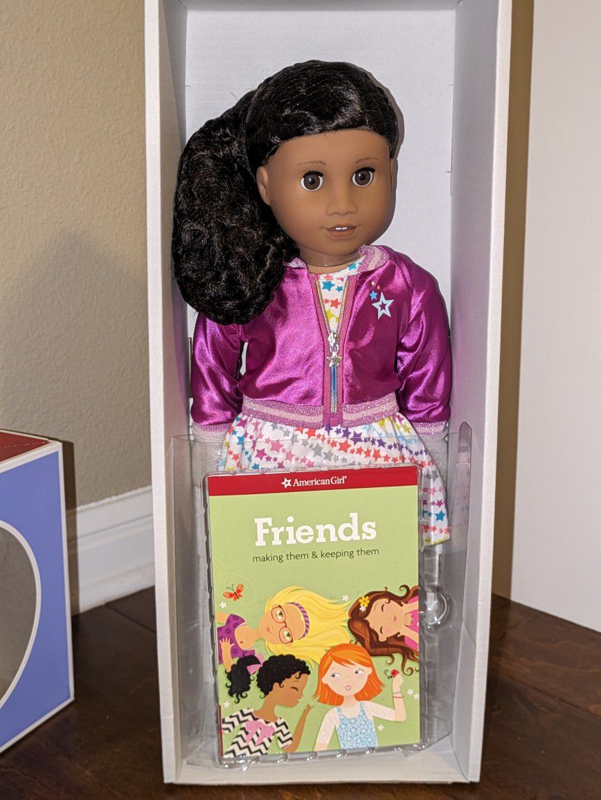 New in the box American Girl Doll with book. Newer was taken from the box.
