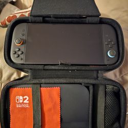 Basically new nintendo switch 2 /w carry case