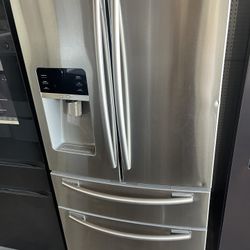 Samsung four-door refrigerator. We finance comes with a 90 day warranty.