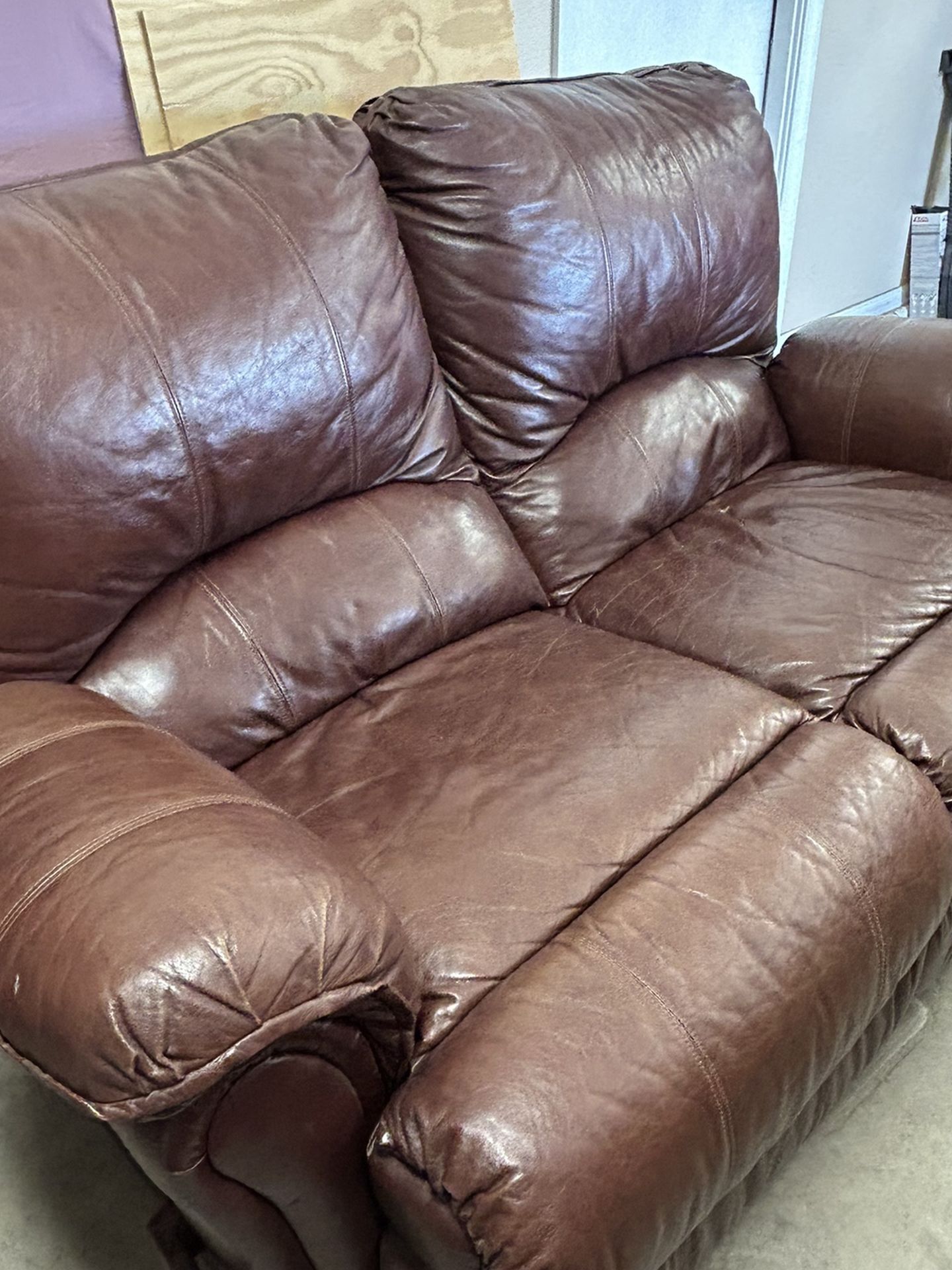 Leather Loveseat that Rocks and Reclines!
