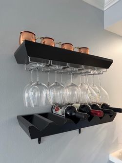 Pottery Barn Wall Wine Rack ($750)