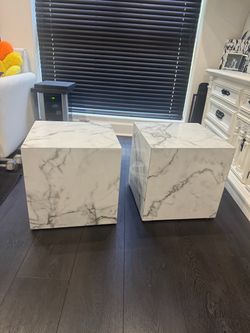 2 white night stands with charger ports