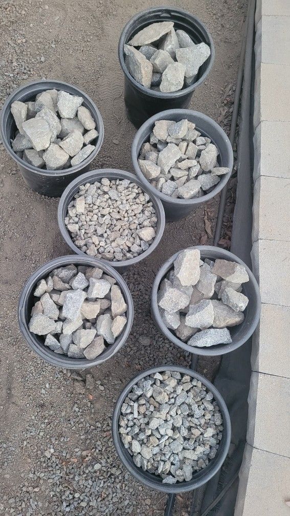 Buckets of granite rocks