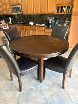 52" round dining table with 4 chairs