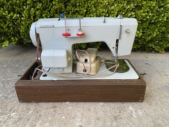 Signature Sewing Machine