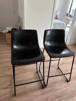 Faux black leather, counter height stools