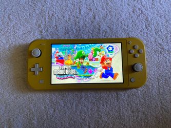 NINTENDO SWITCH LITE + 7000 GAMES INSTALLED