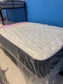 New full mattress and box spring 2 pc bed frame is not included