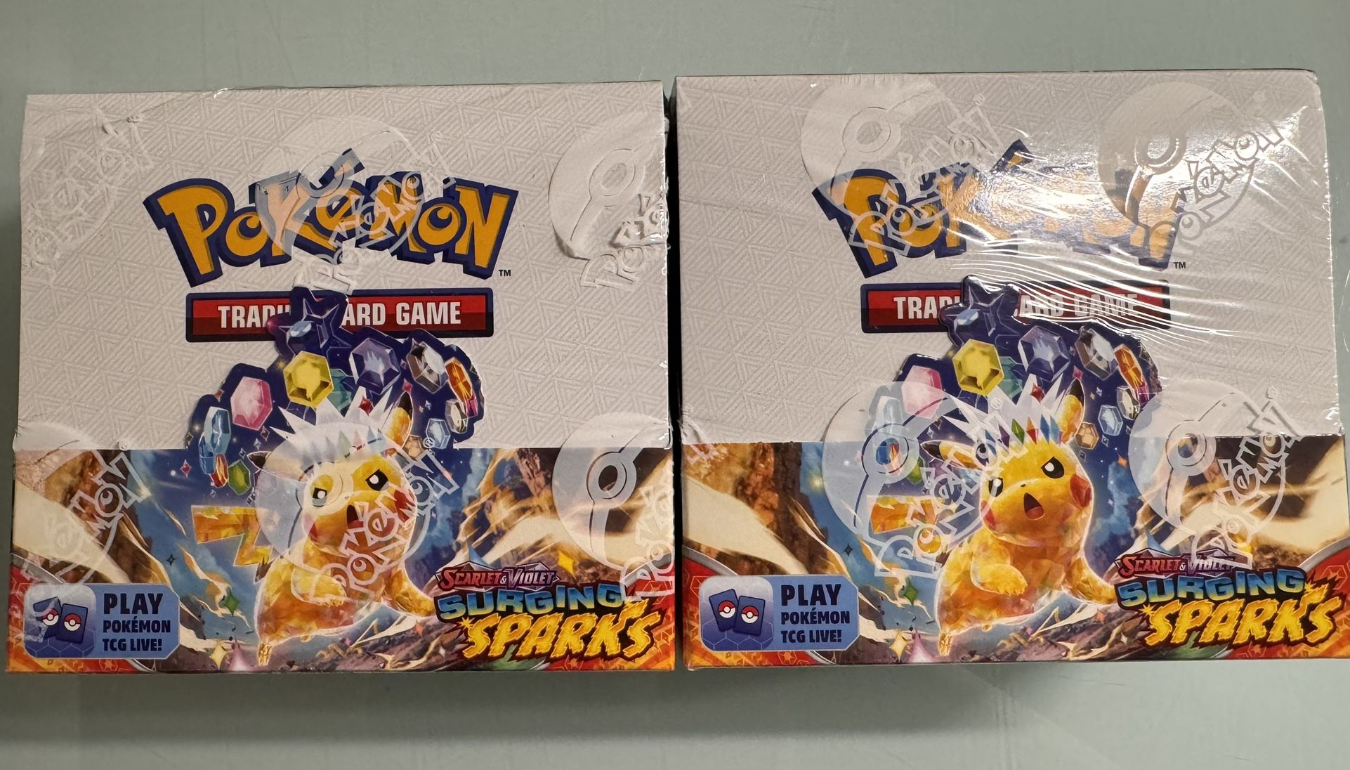 Surging Sparks Booster 2x Pick Up Only No Holds