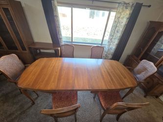 Beautiful dining room table with three leaves real wood 1 of 3