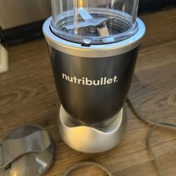 NutriBullet - With Cup, Blender Cap, And Sipping Cap