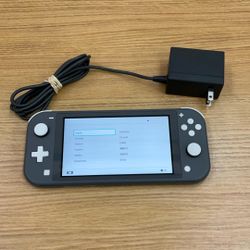 NINTENDO SWITCH LITE HANDHELD CONSOLE.