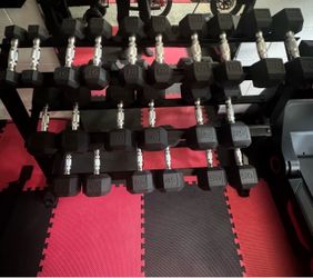 Premium Hex Dumbbell Set with a 3-Tier Rack, featuring weights from 5–50 lb. Approximately 574 lbs of total dumbbells