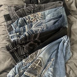 Western style Pants sizes vary (28,29,30,32)