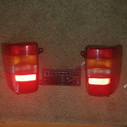 1998 Grand Jeep Stock taillights & stereo/CD player