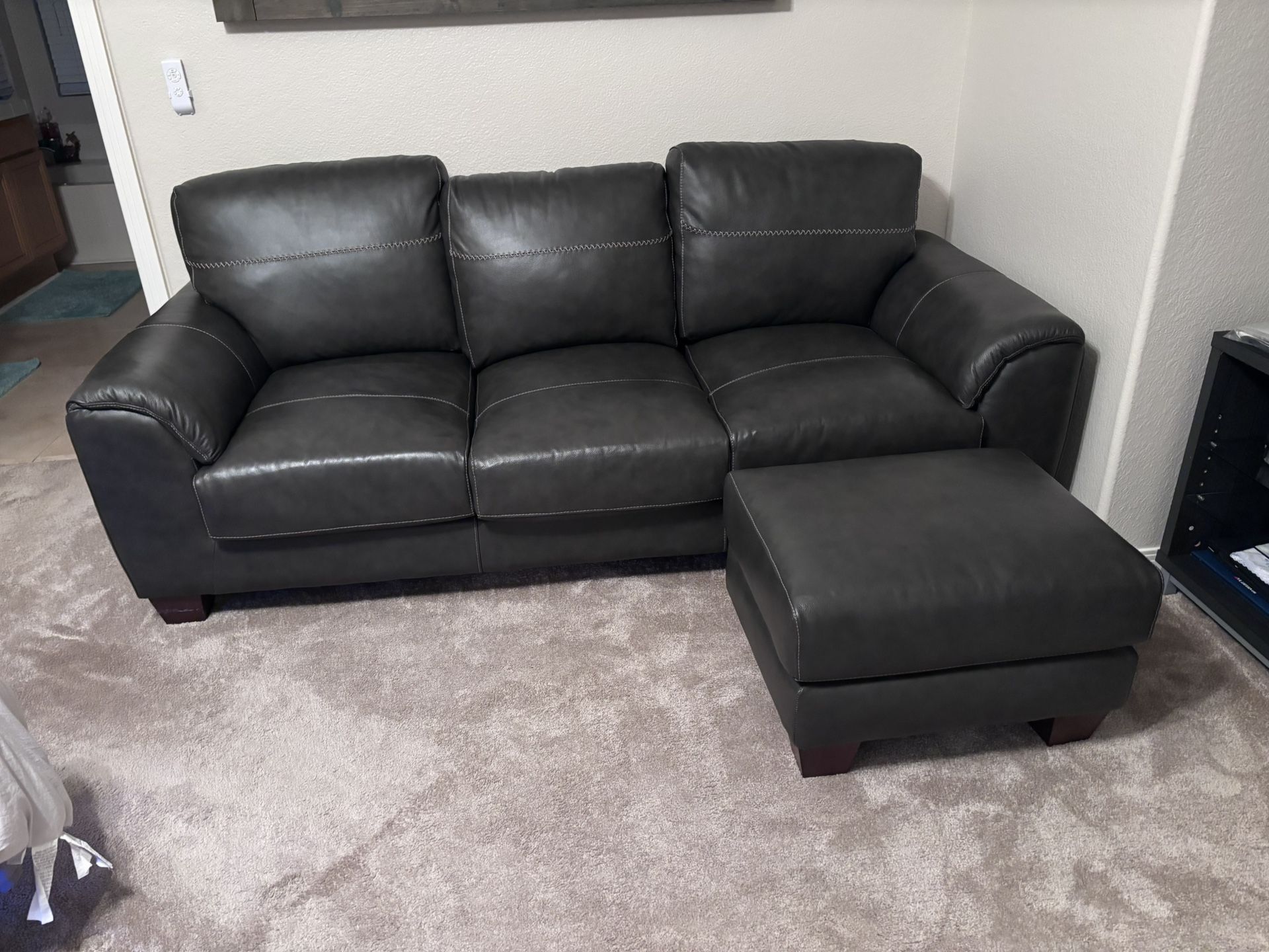 Black Leather Couch, Ottoman, 2 Pillows