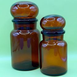 Set Of 2 apothecary jars with lids is a wonderful addition to any antique collection