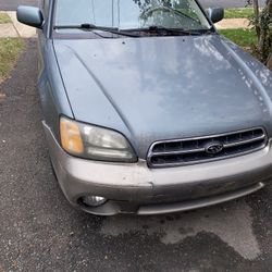 Subaru outback limited edition runs great air works as you could see it needs a door and some bodywork good engine and tranny 1750 or best offer call 
