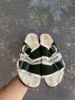 Birkenstock Arizona in Mountain View Green suede with shearling lining.