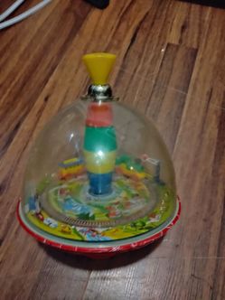 Kid's rotating spinning top
