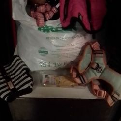 LG bag of Sm. dog harnesses and outfits 