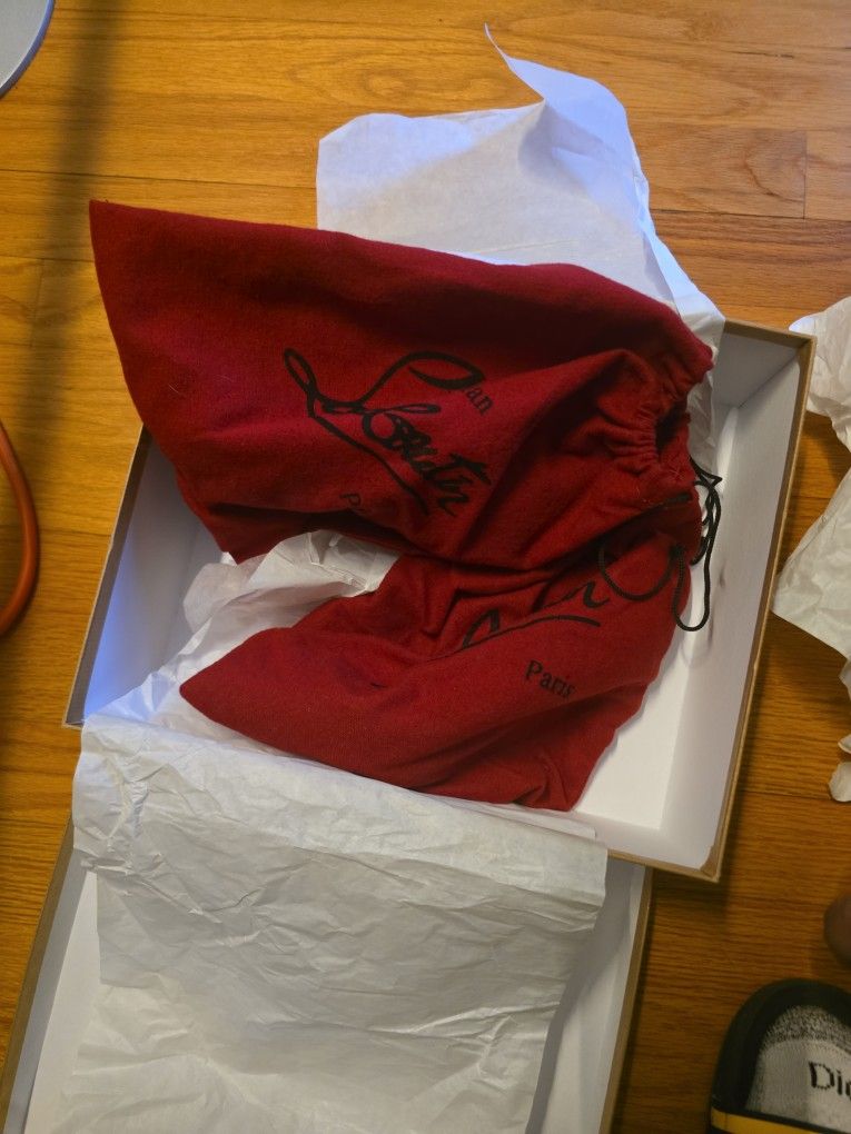 Christian Louboutin, Red and black size six