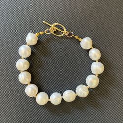 Freshwater pearl bracelet, 14 K gold plated, 7.5”, 10mm