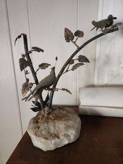 Curtis Jere bronze birds on rock