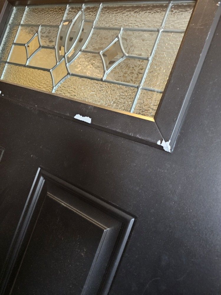 BLACK FIBERGLASS FRONT DOOR....36" x 80"......WITH SOME SCRATCHES.....$ 150