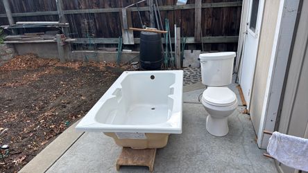 White Bathtub and Toilet Set