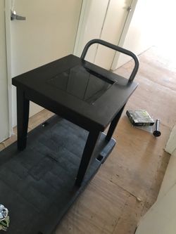 End table with wood and glass top