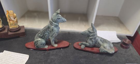 Antique estate sales Jade dog sculptures.