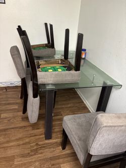 Glass table with chairs