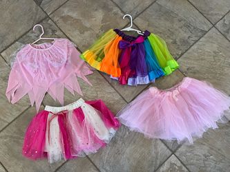 (4) dress-up skirts (unicorn, princess). Size-2-4yrs