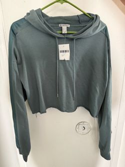 Women’s size large dress and cutoff hoodie brand new with tags.