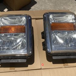 Used SET OF 2008-2010 FORD F-250/F-350 OEM FACTORY HEADLIGHTS