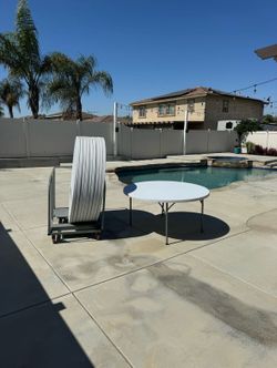 60” Round table with Dolly $1200