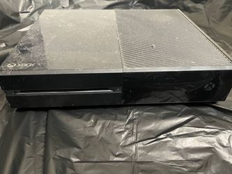 Xbox with controller and games