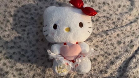 Hello kitty plush with heart
