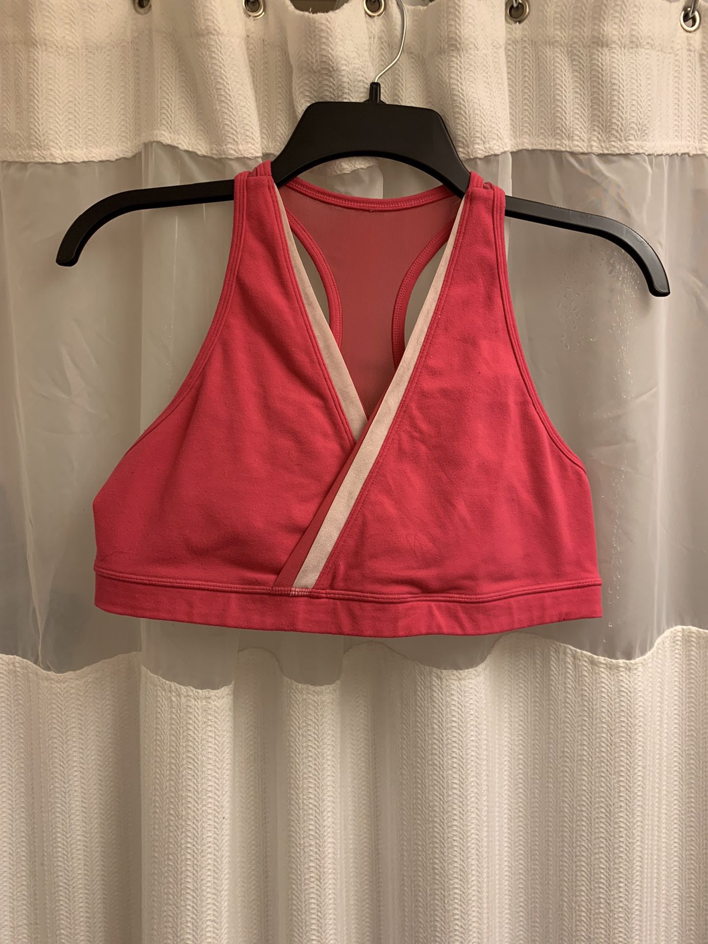 Lululemon pink front wrap sports bra size 12 fair condition, used, no bra pads included