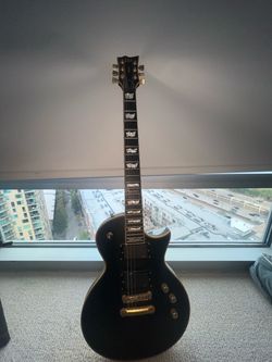 ESP LTD EC-1000 Deluxe Electric Guitar – Black & Gold – EMG Pickups