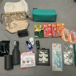 Cosmetics, some makeup brushes, and other accessories.